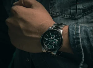 mans wrist wearing a watch